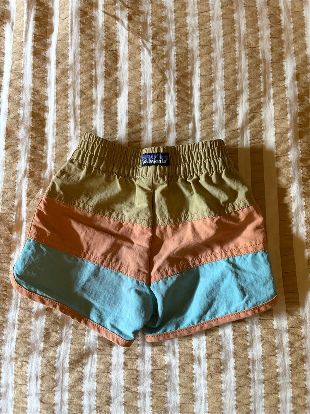 Patagonia Girls Colorblock Athletic Shorts in Olive, Peach & Light Blue